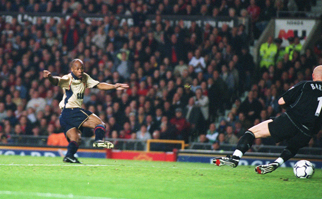 Sylvain Wiltord scores the winning goal for Arsenal at Manchester United Old Trafford