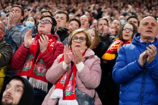 Liverpool fans clap in the seventh minute in a mark of respect to Cristiano Ronaldo