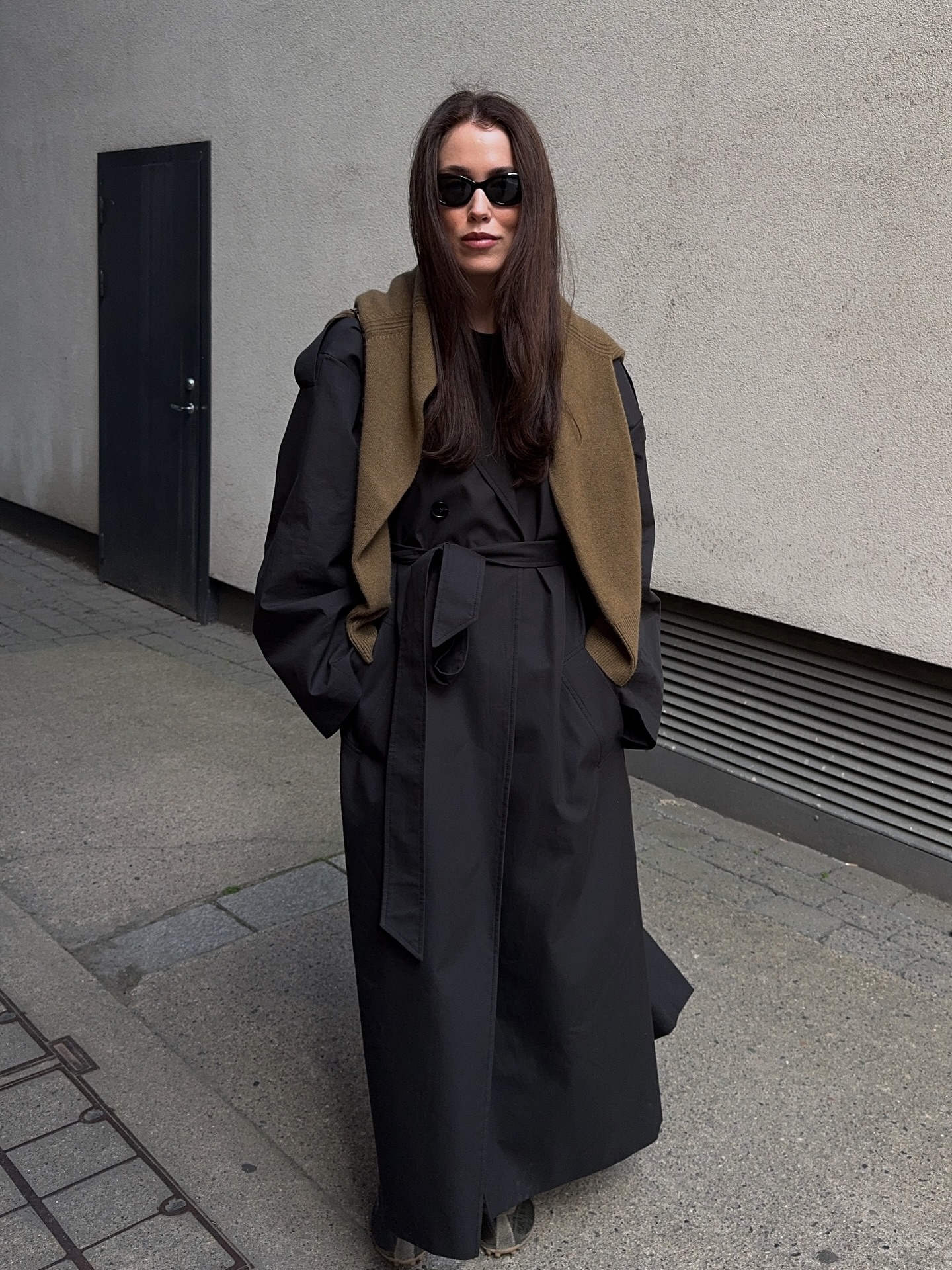 Annabel Rosendahl wears a mole triangle scarf with a black trend coat.