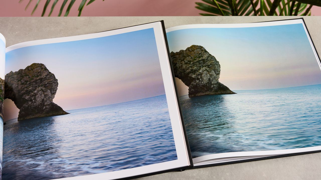 The print in the Blurb book is noticeably warmer and smoother, whereas posterization can be seen in the sky of the Snapfish print, as the colors have noticeable steps rather than smoothly blending.