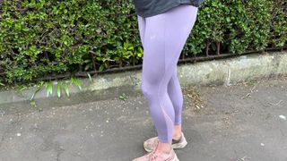 The author modelling the Asics Distance Supply Tights in violet quartz heather