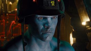 Aneurin Barnard with blue skin and a helmet in Rogue Trooper