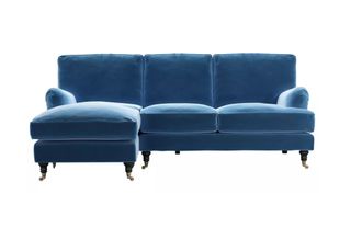 A blue velvet chaise sofa