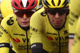 Team Visma-Lease a Bike's Danish rider Jonas Vingegaard (L) cycles during the 2nd stage of the Paris-Nice cycling race, 183,9 km between Montesson and Bellegarde, on March 10, 2025. (Photo by Anne-Christine POUJOULAT / AFP)