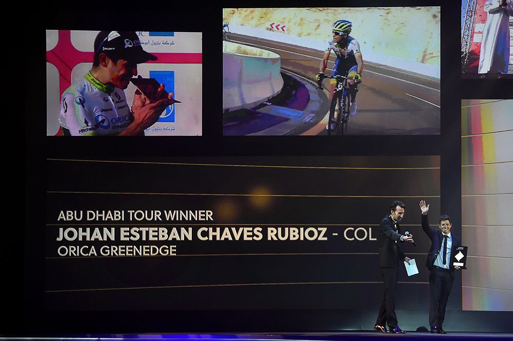 Esteban Chaves collects his prize for his overall win at the Abu Dhabi Tour