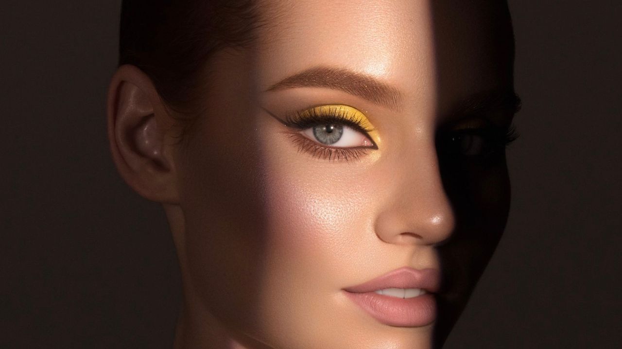 Woman with yellow cut crease eyeshadow