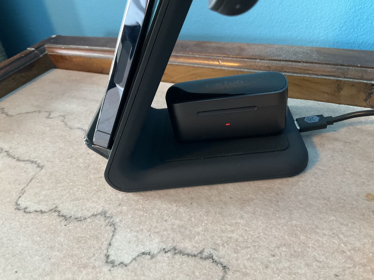 Stm Goods Chargetree Swing 3 In 1 Charging Station Lifestyle Earbuds Closeup
