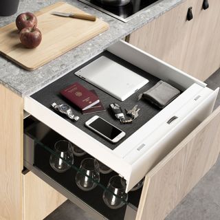 kitchen worktop with drawer and wooden chopping board