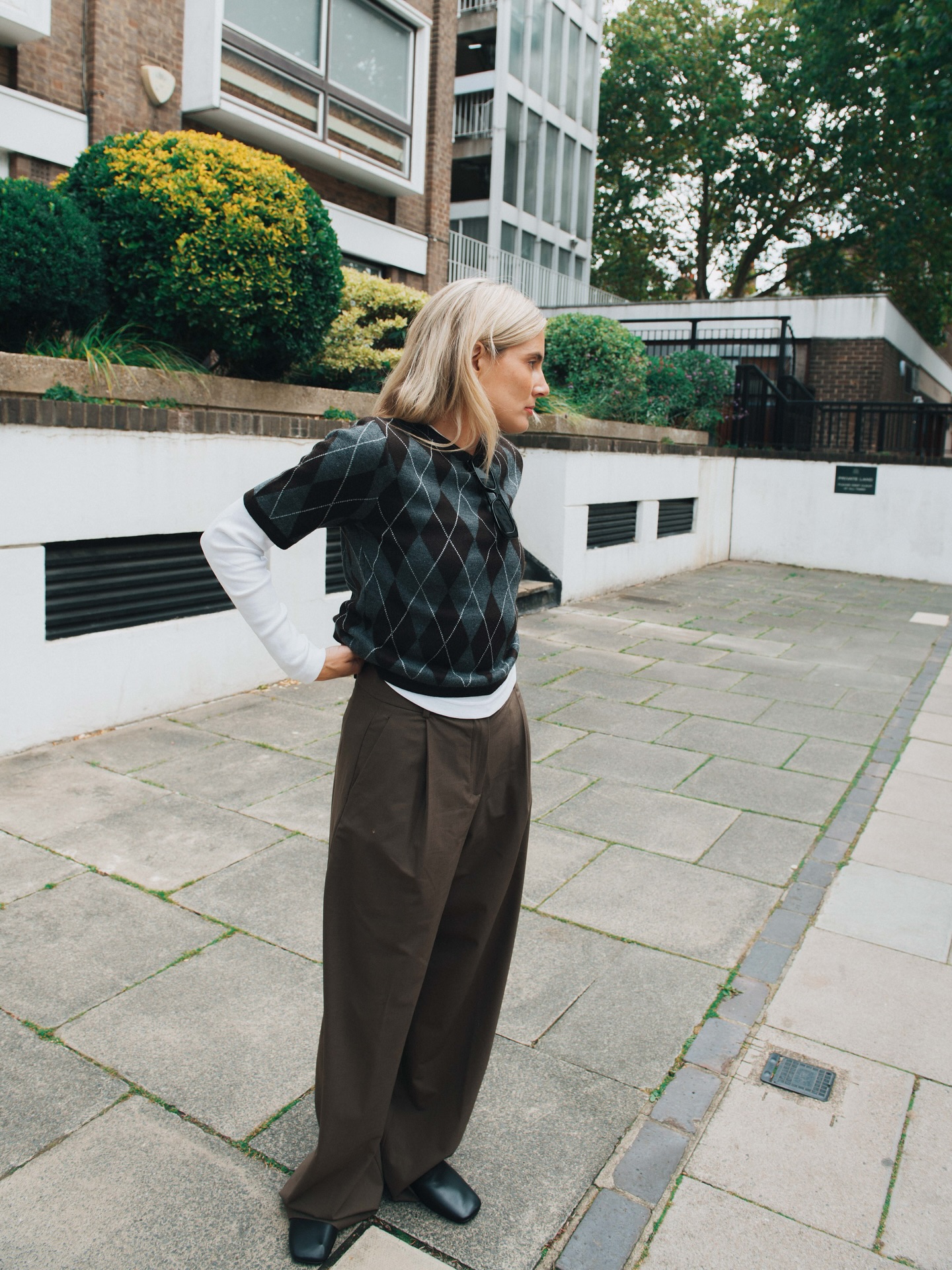 Lucy wearing argyle jumper