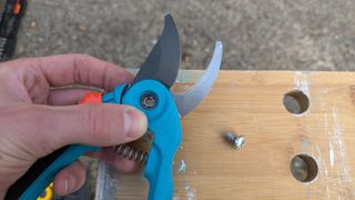 Reassembling the halves of a pruner