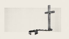 Photo composite of a crucifix with a manacle and chain attached