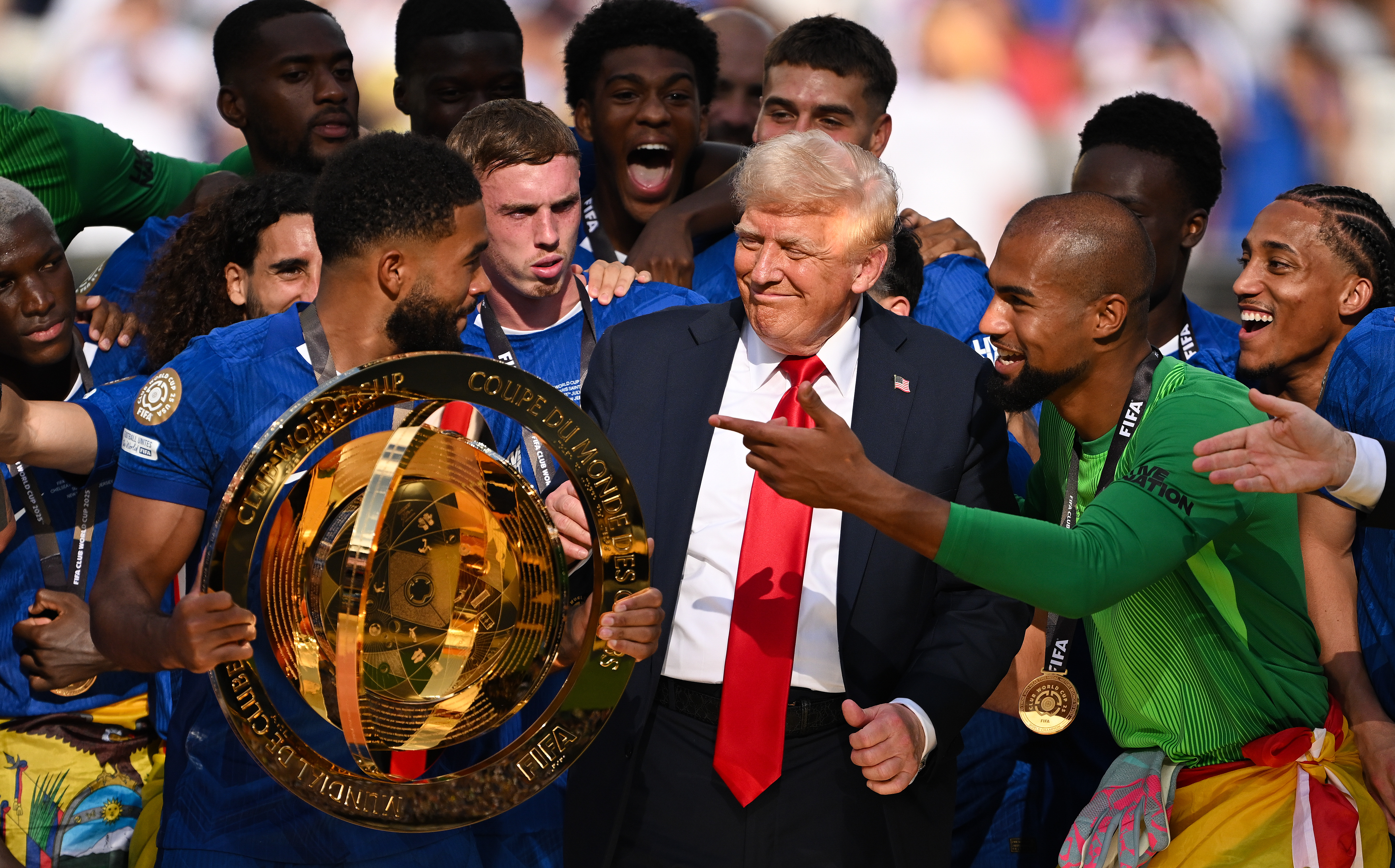 Chelsea FC players are joined by the President of the United States Donald Trump after winning the Club World Cup