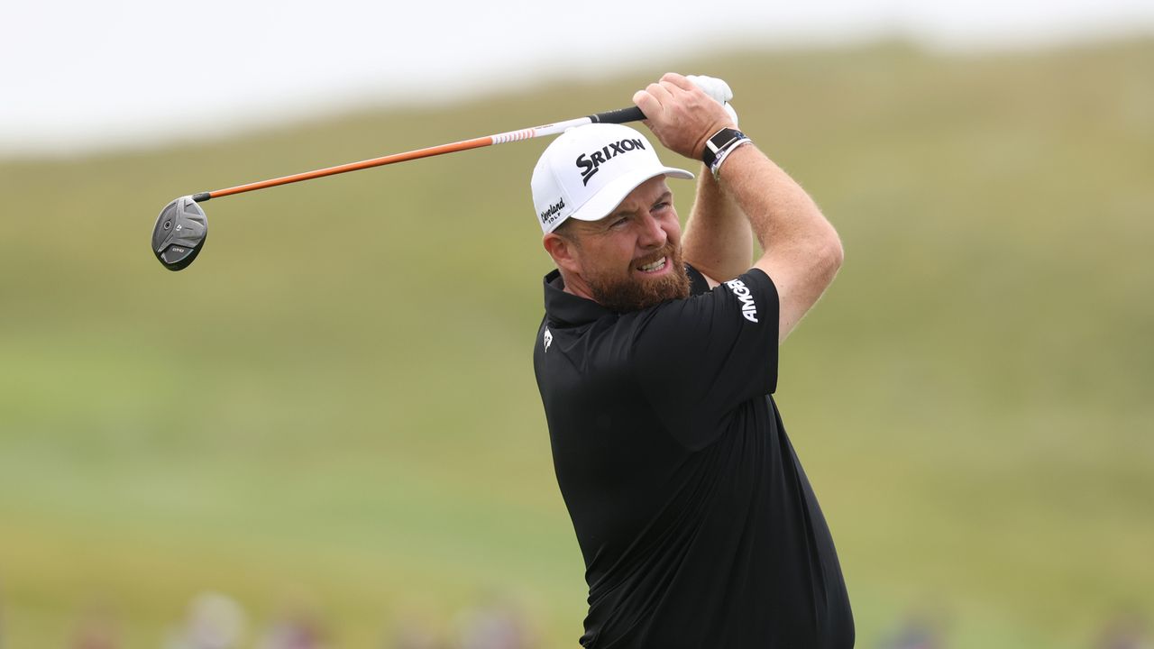 Shane Lowry hits a fairway wood