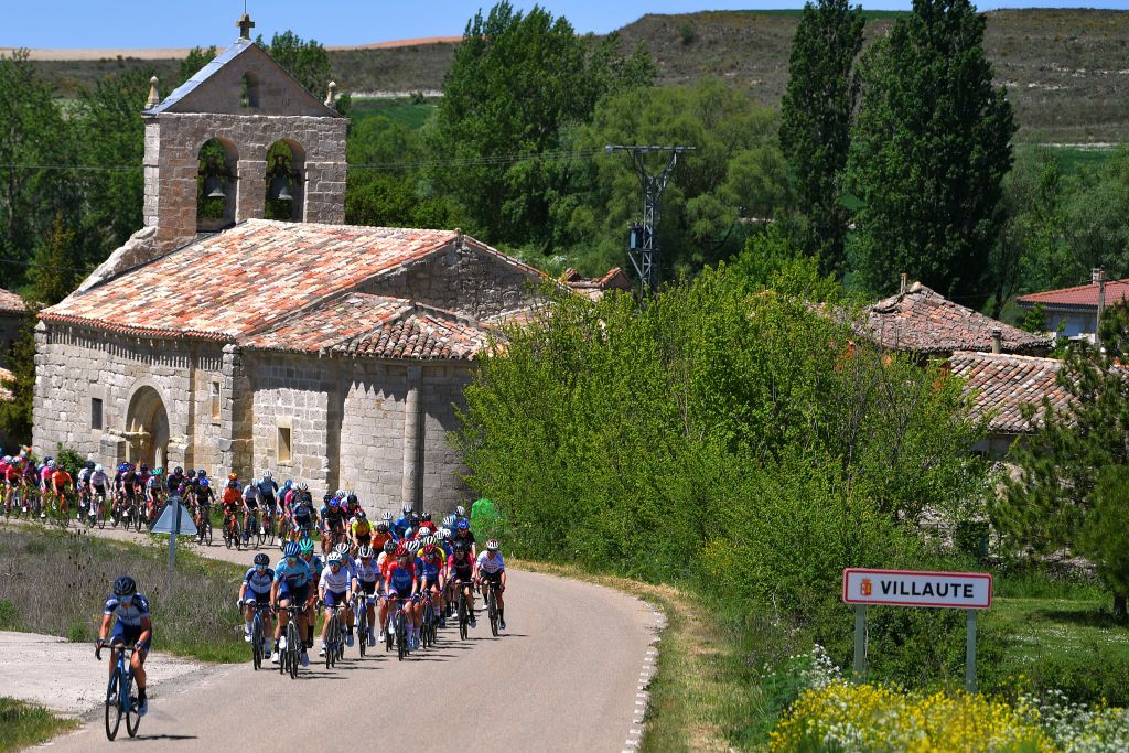 SARGENTES DE LA LORA SPAIN MAY 20 The peloton passing through Villaute Village landscape during the 6th Vuelta a Burgos Feminas 2021 Stage 1 a 100km stage from Villadiego to Sargentes de la Lora 1013m Landscape VueltaBurgos BurgosFem UCIWWT on May 20 2021 in Sargentes de la Lora Spain Photo by Luc ClaessenGetty Images