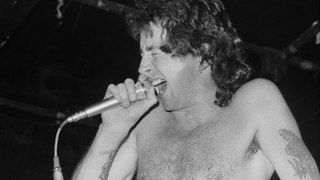 Bon Scott performing with AC/DC at the Marquee Club, London, 12th May 1976.