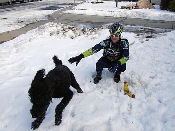 Gunn-Rita plays with a mountain biker's best friend.