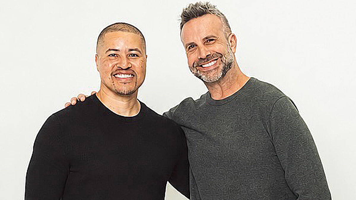 Story Kitchen co-founders Dmitri Johnson and Mike Goldberg smiling and looking directly into the camera