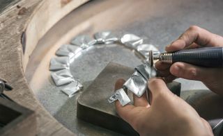 The necklace worn by Princess Leia in Star Wars being crafted