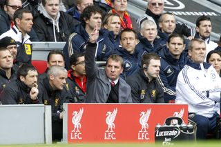 Brendan Rodgers, centre, in the Anfield dugout during his time as Liverpool manager