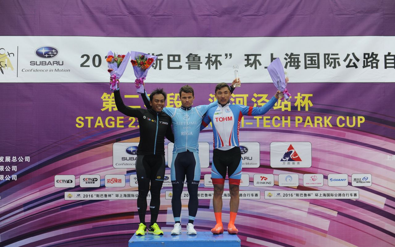 Emils Liepins, Anuar Manan and Ahmet &Ouml;rken atop the stage 2 podium at the inaugural Tour of Shanghai