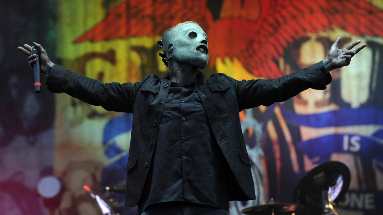 Corey Taylor with arms outstretched on stage at Download