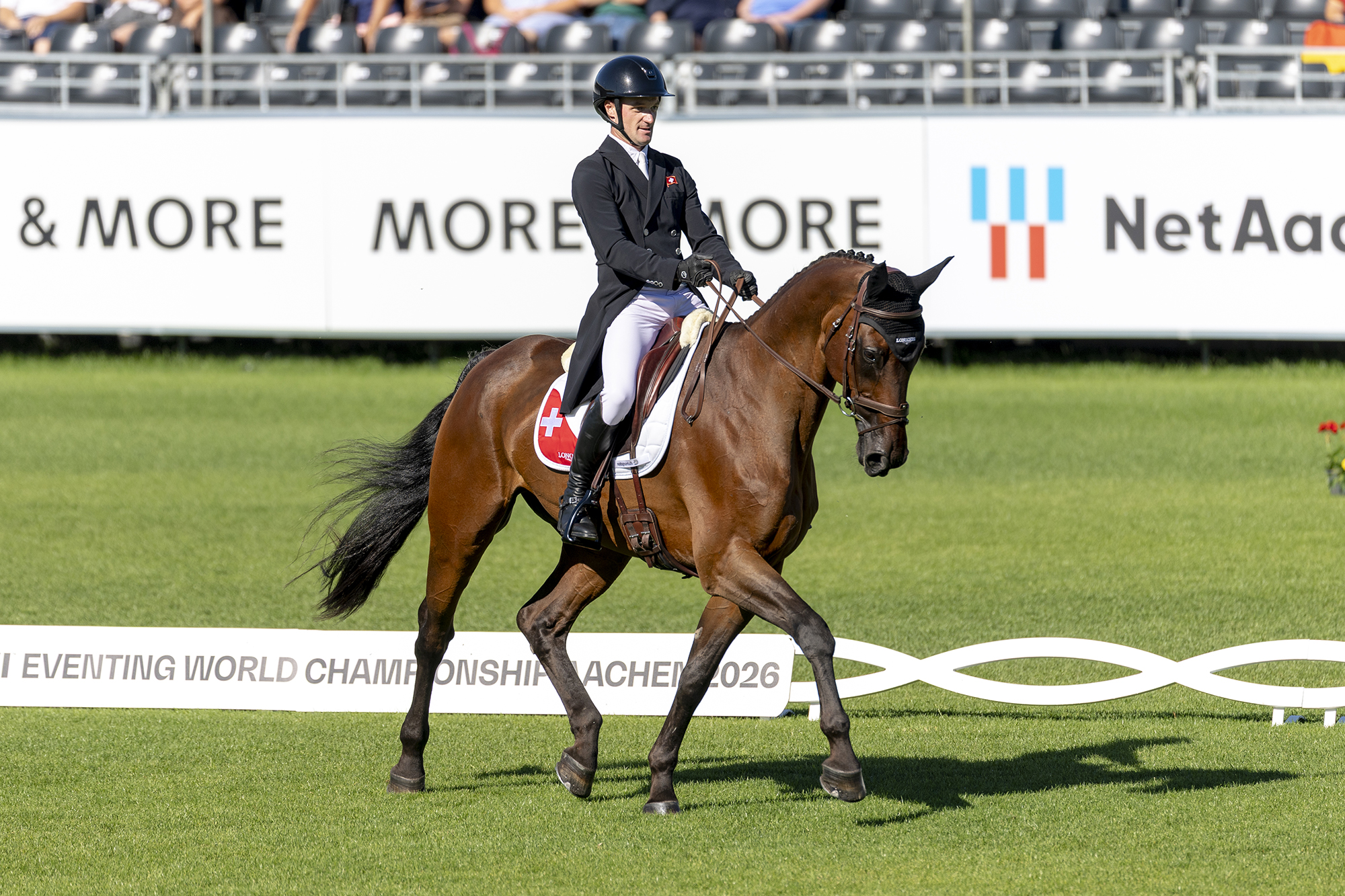 Robin Godel and Grandeur De Lully CH complete a movement in trot in their dressage test at the World Championships in Aachen, the horse&amp;rsquo;s final big event before he was retired