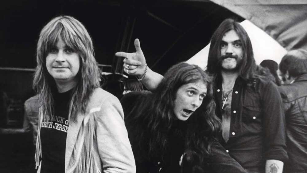 Ozzy with Motörhead's Eddie Clarke and Lemmy backstage at the Heavy Metal Holocaust
