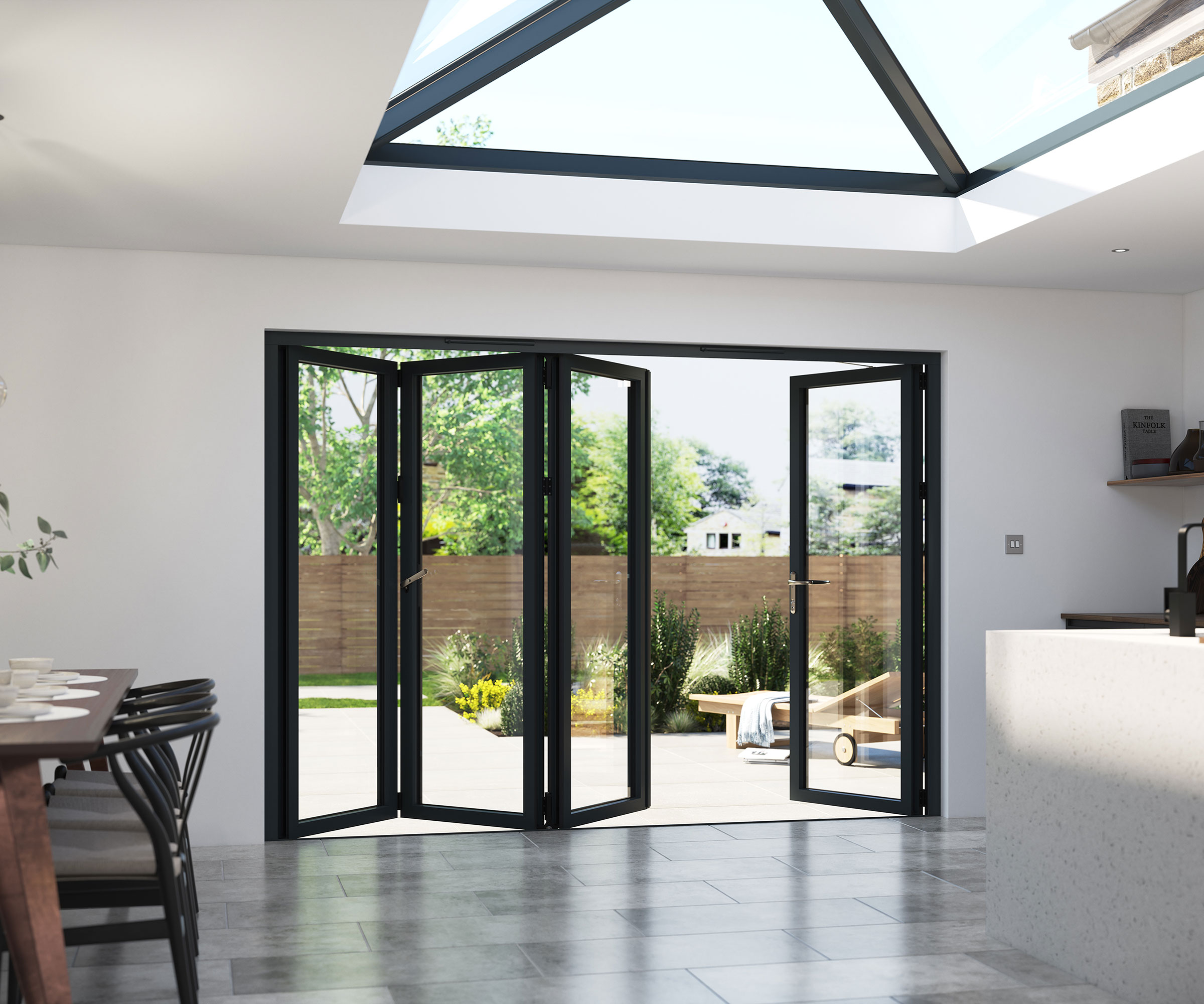 kitchen extension with bifolding doors leading out to a patio area
