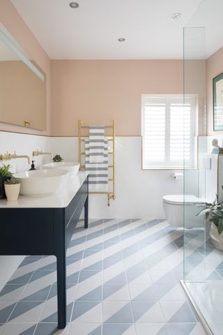 Blue and white diagonal bathroom tiles