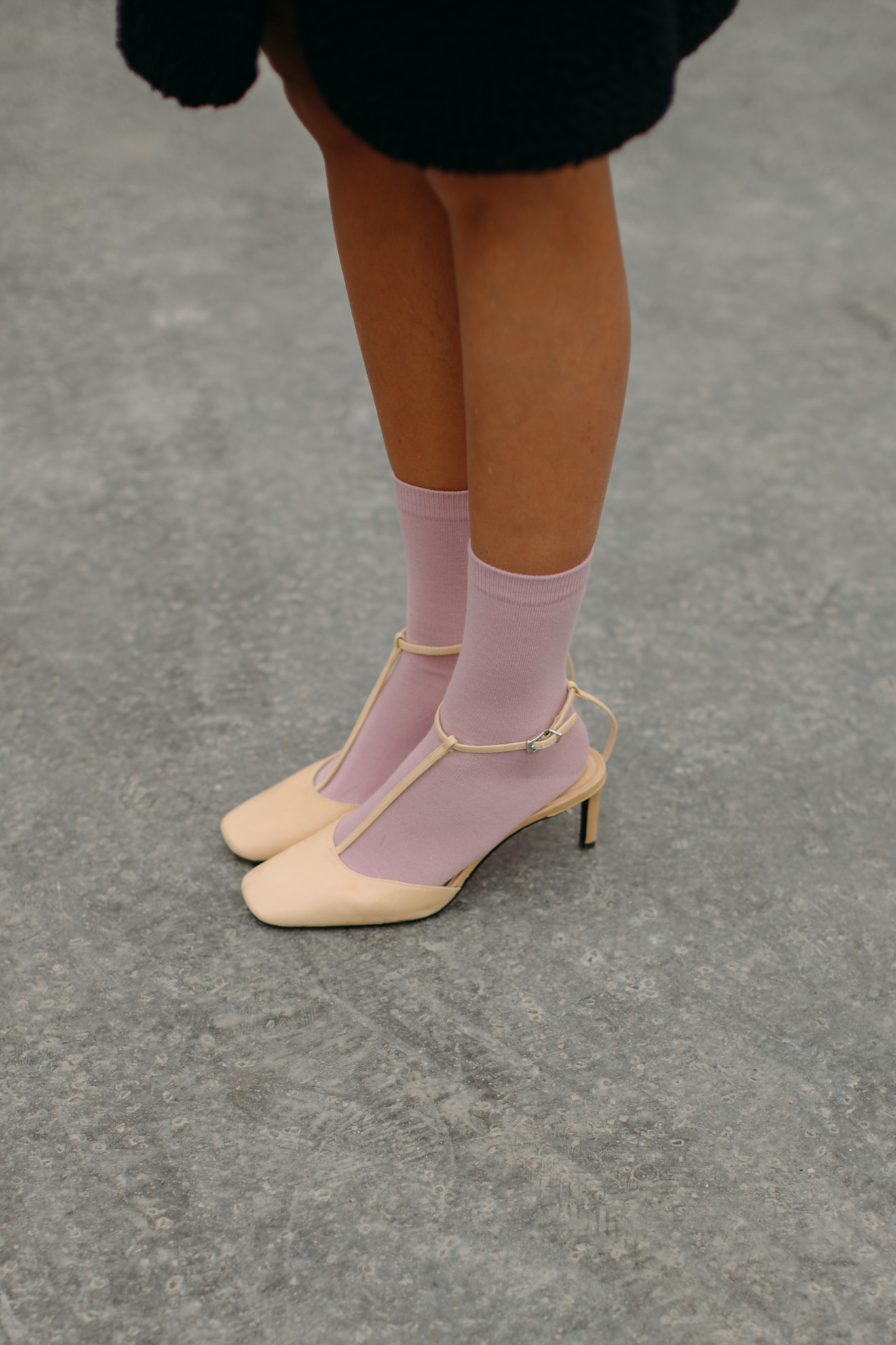 Woman in butter yellow shoes at Paris Fashion Week