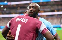 Yoane Wissa and DR Congo goalkeeper Lionel Mpasi