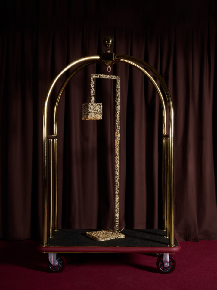 A series of images depicting brass-clad furniture, or sheeny coffee tables, in a lavish, luxury hotel-inspired setting.