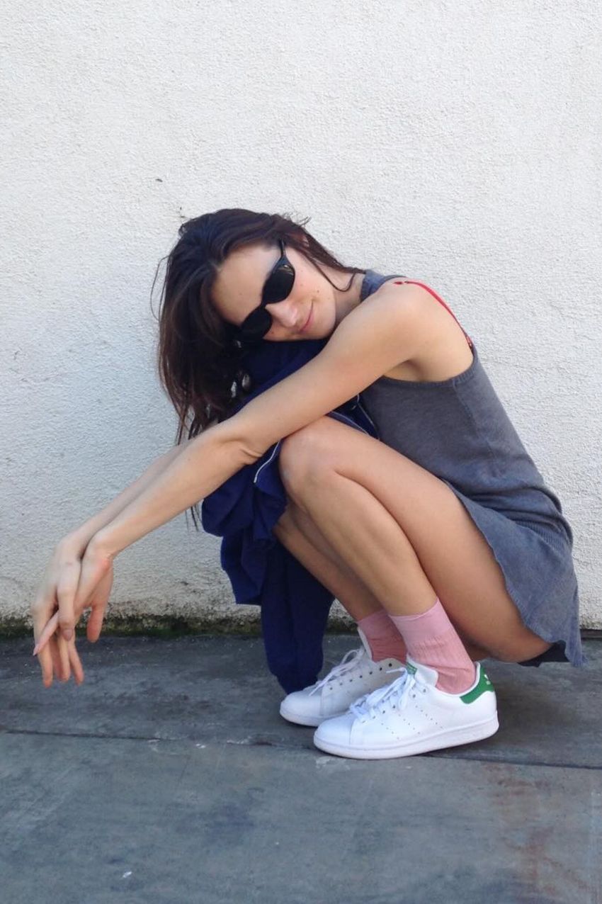 a woman wearing pink socks