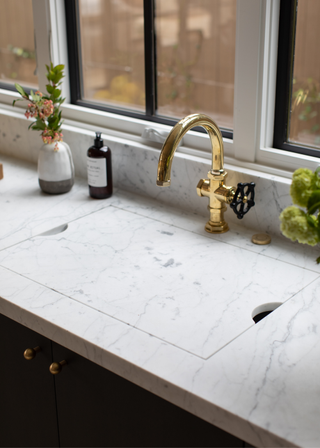 marble kitchen sink covered with marble top in continuation of the worktops