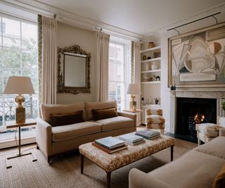 Living room with cream colour palette and fireplace