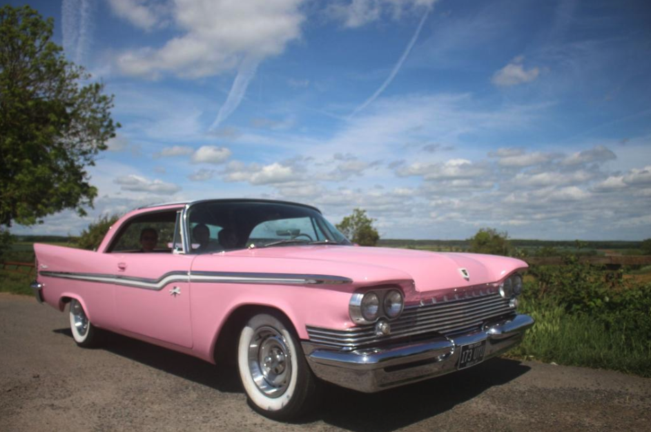 A pink Chrysler Windsor Golden Lion in the British Countryside