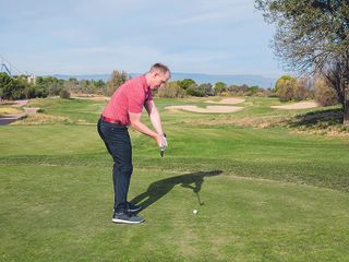 Golf Monthly Top 50 Coach John Howells demonstrating the swing plane in the downswing