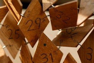 numbered pieces of wood, part of sculpture in progress