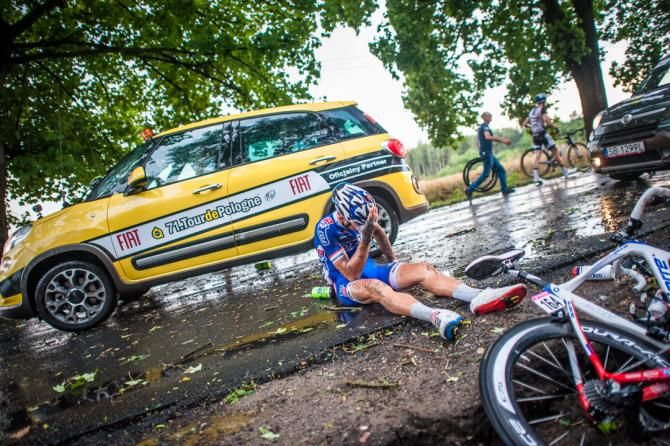 Johan Le Bon (FDJ) checks his condition after falling during the stage