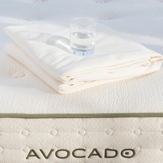 Organic Waterproof Mattress Protector on a bed.