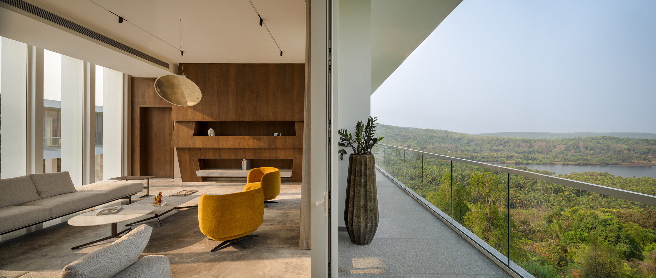 a white Goa villa in the leafy indian forest