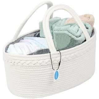 Cream Cotton Rope Basketwith handles paked with towels