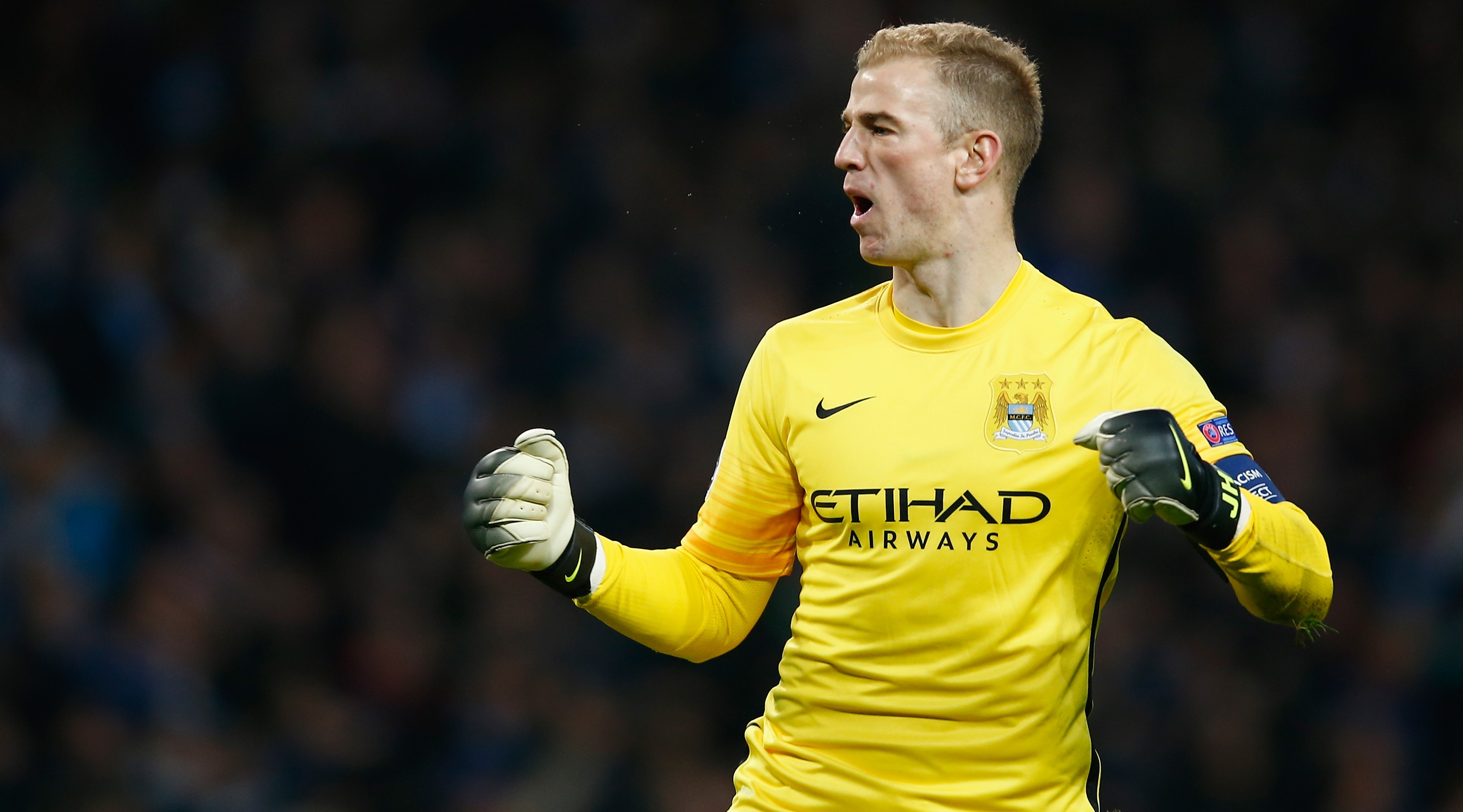 MANCHESTER, ENGLAND - APRIL 12: Joe Hart of Man City celebrates them winning a penalty decision during the UEFA Champions League Quarter Final second leg match between Manchester City FC and Paris Saint-Germain at the Etihad Stadium on April 12, 2016 in Manchester, United Kingdom. (Photo by Christopher Lee - UEFA/UEFA via Getty Images)