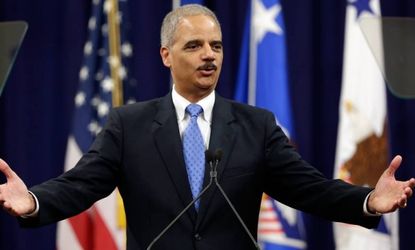U.S. Attorney General Eric Holder speaks during outgoing FBI Director Robert Mueller's farewell ceremony on August 1.