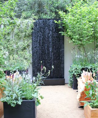 A black water feature at RHS Chelsea Flower Show