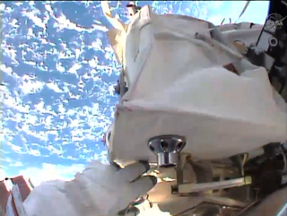 US Spacewalk with Earth below