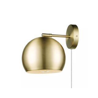 round wall light in brass