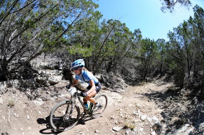 Judy Freeman riding one of the many dry creek beds