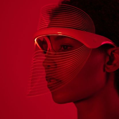 Woman wearing an LED mask