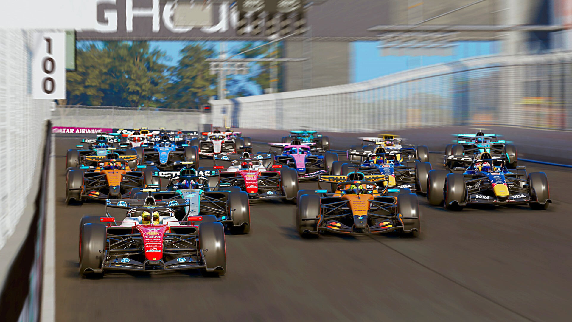 A promotional screenshot of F1 25 from EA showing close racing from every car on the grid being led by Lewis Hamilton's Ferrari.